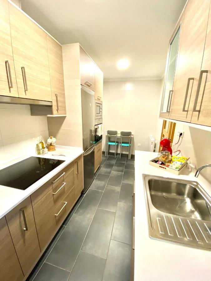 Arenal Home, Parking Gratis لوغو المظهر الخارجي الصورة