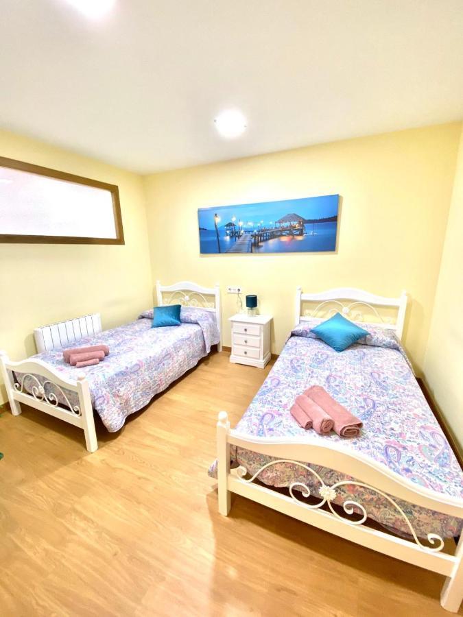 Arenal Home, Parking Gratis لوغو المظهر الخارجي الصورة